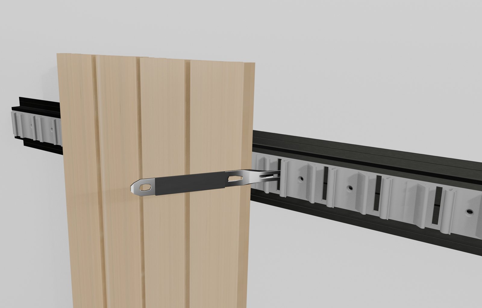 A slat being levered onto the clips with the NewClick mounting tool